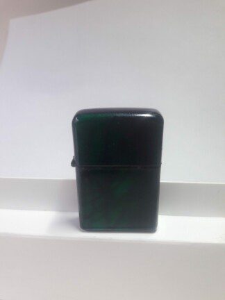 MECHERO con el cuerpo jaspeado de color verde y negro